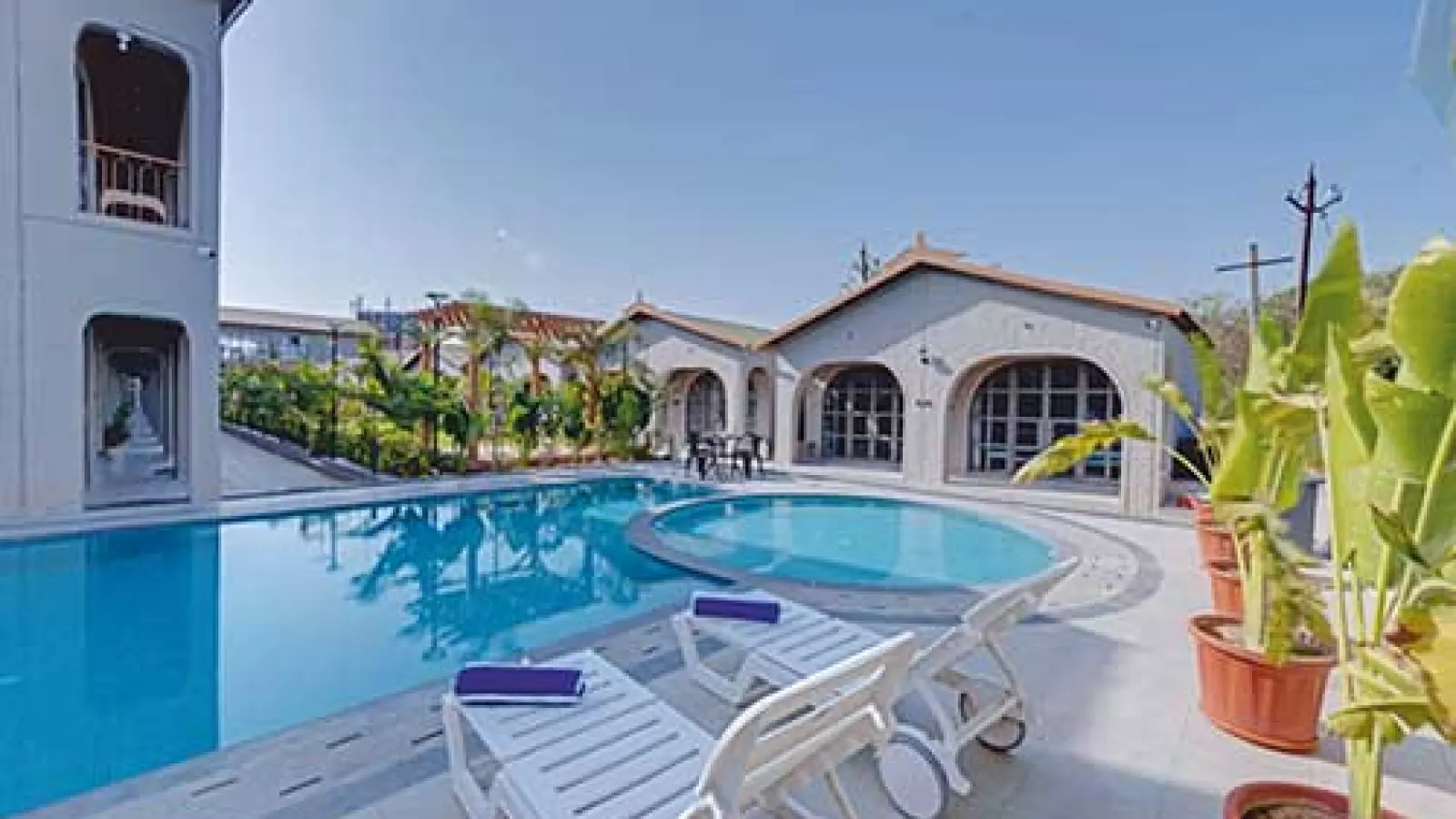 Villa Euphoria: Twin Villas Blend Traditional Charm with Contemporary Sophistication