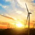 Focus shifts to grids, storage, and private capital to meet 2070 goals.