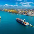 A 14-year port tariff battle heads for resolution through a negotiated settlement framework.