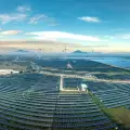 Group captive wind-solar project to power Dahej and Vadodara units with green electricity.