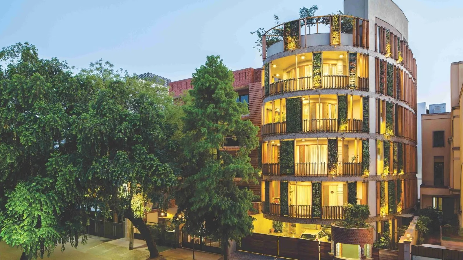 Outré House in New Delhi Reimagines Urban Living Through Craft, Curves and Nature